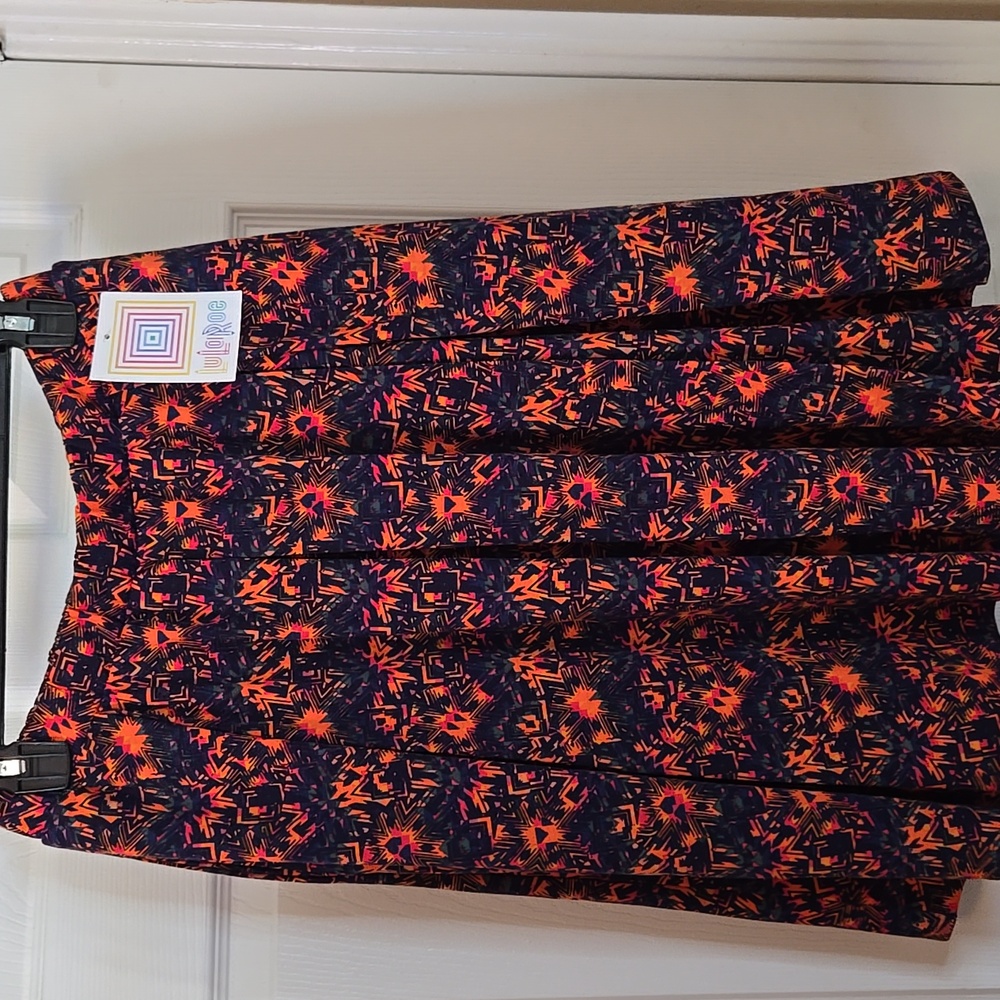 LuLaRoe Navy Skirt with Bright Orange and Pink Starburst Print